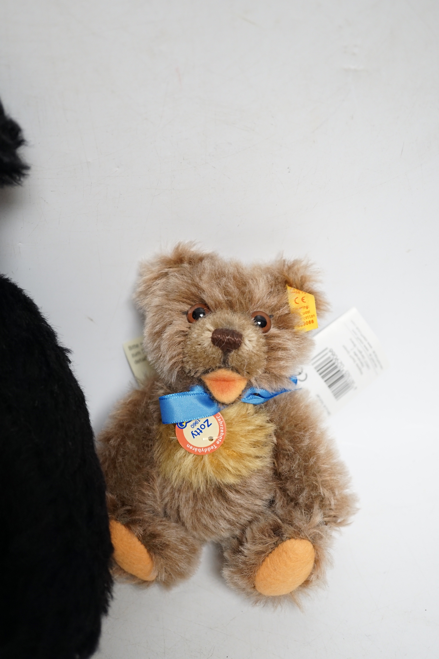 A Steiff musical Black Watch bear with bag and certificate with small Steiff Zotty yellow tag with bag